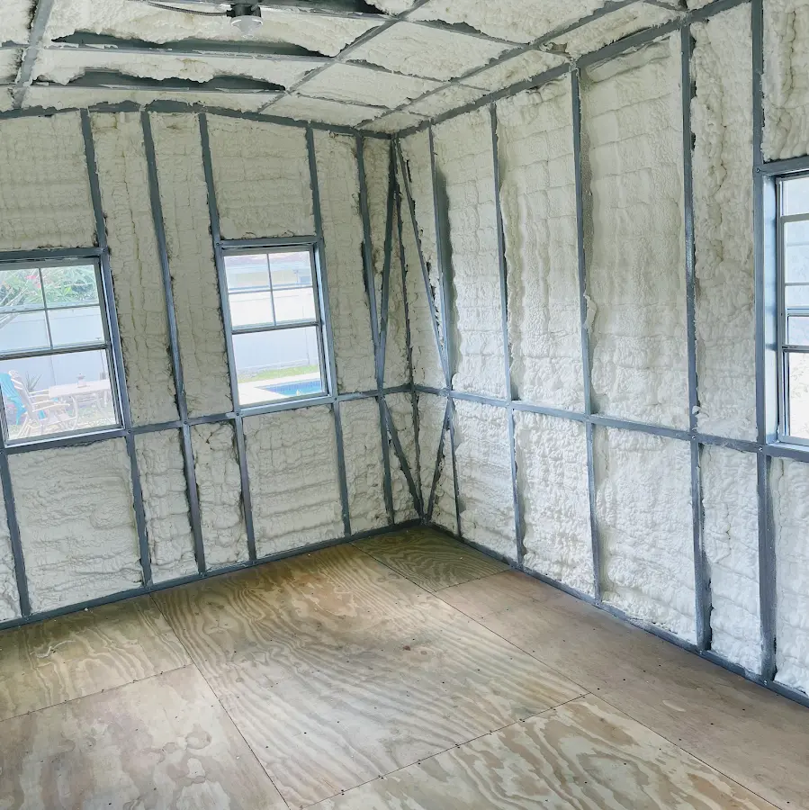 Closed-cell spray foam insulation applied to wall cavities in a residential project in Grosse Pointe